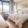 room with a bed and large window
