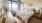 room with a bed and large window